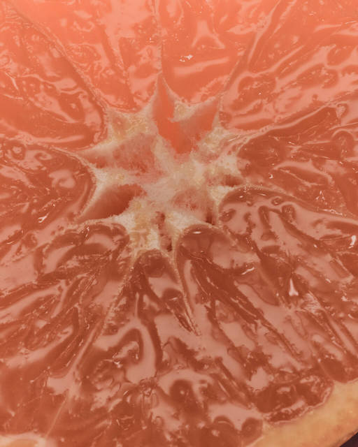 A close-up of the center of a blood orange